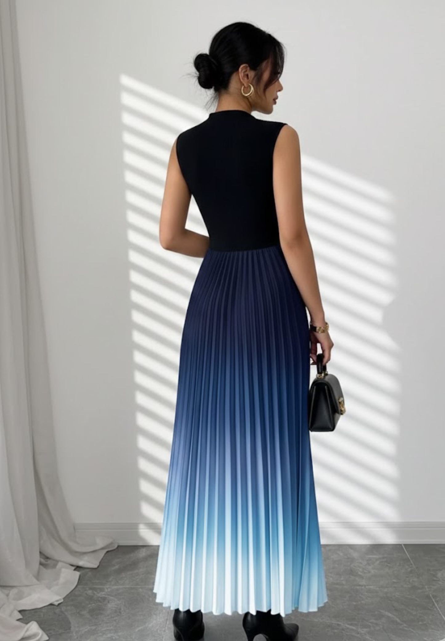 Robe sans manche confortable plissée