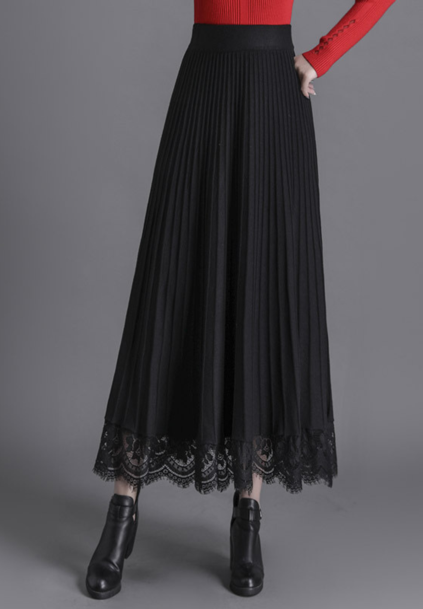 Jupe mi-longue plissée en maille