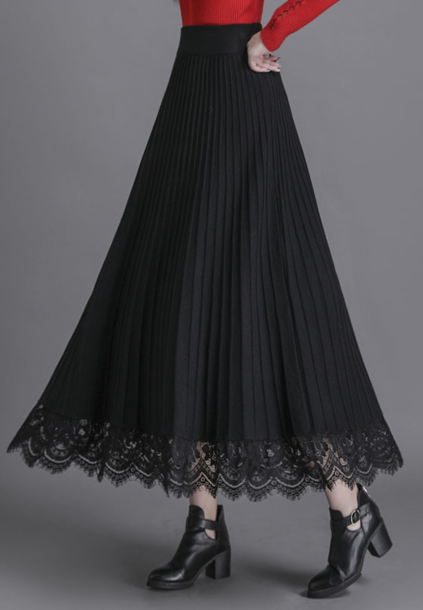 Jupe mi-longue plissée en maille