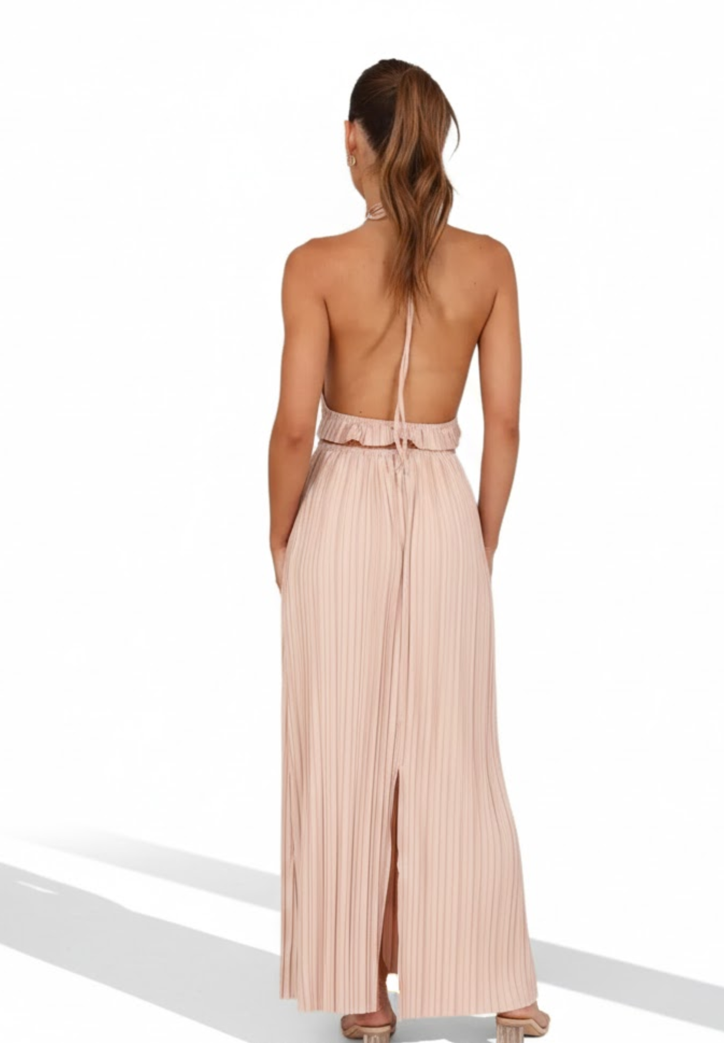 Jupe longue à dos nu plissée