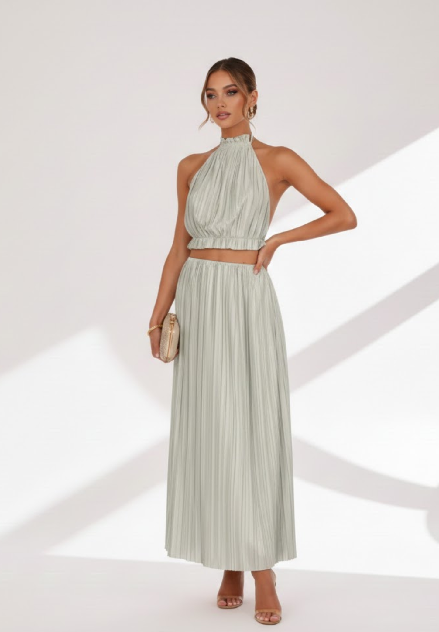 Jupe longue à dos nu plissée
