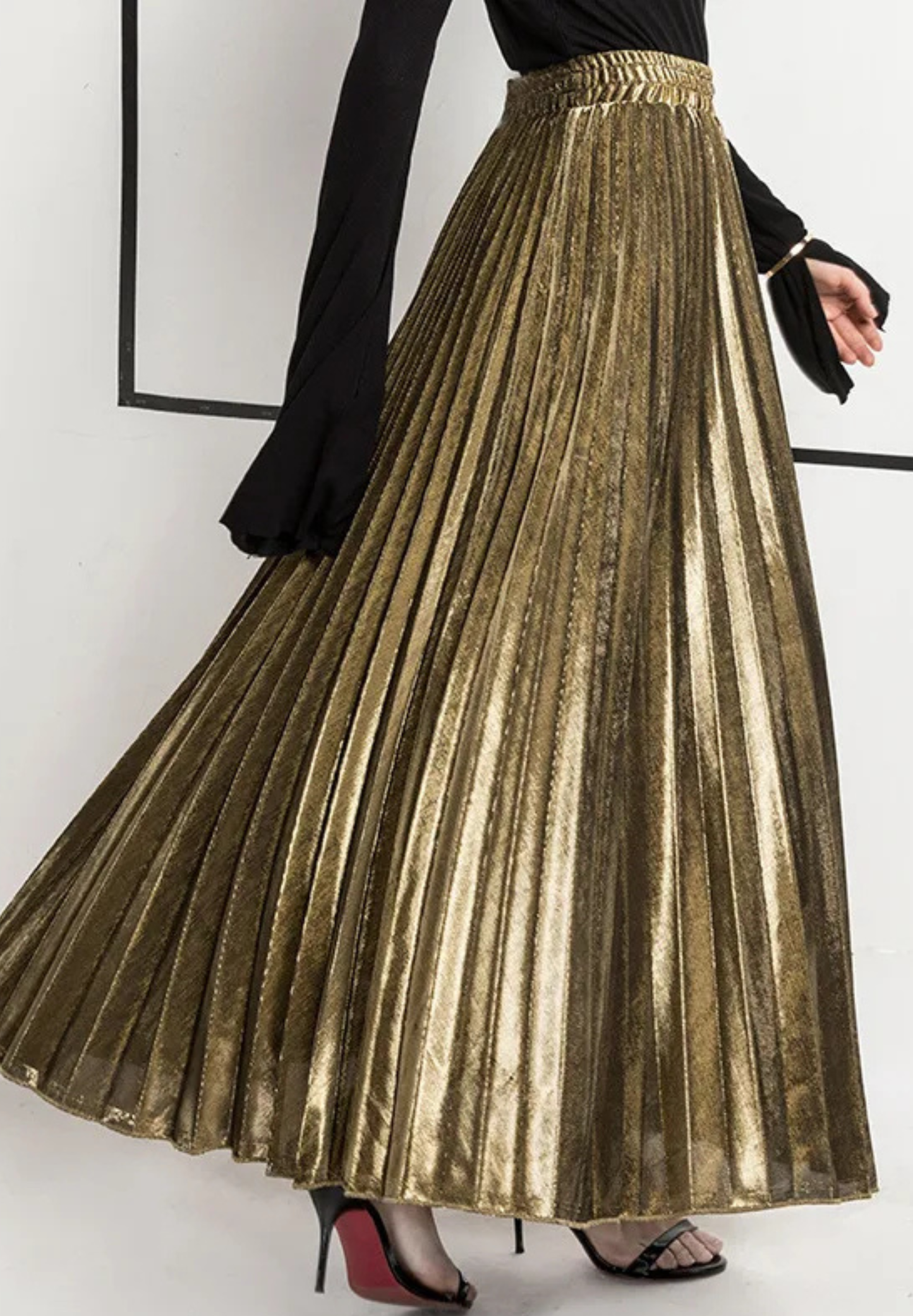 Jupe plissée dorée