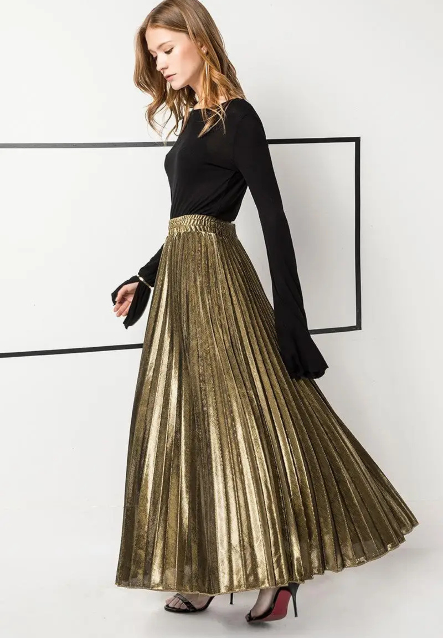 Jupe plissée dorée